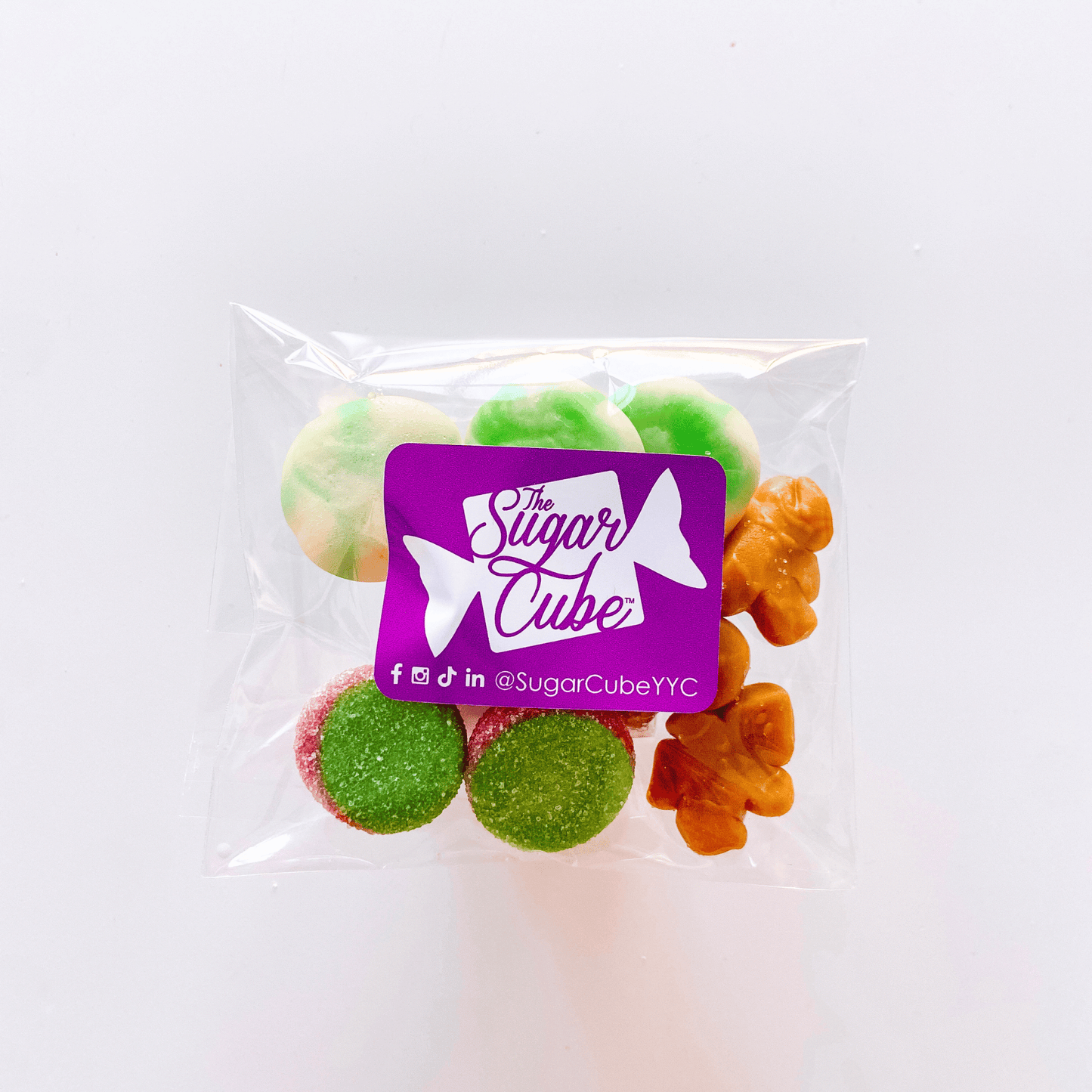Christmas holiday candy bag featuring a cheerful seasonal mix of red, green and white gummies and sweets