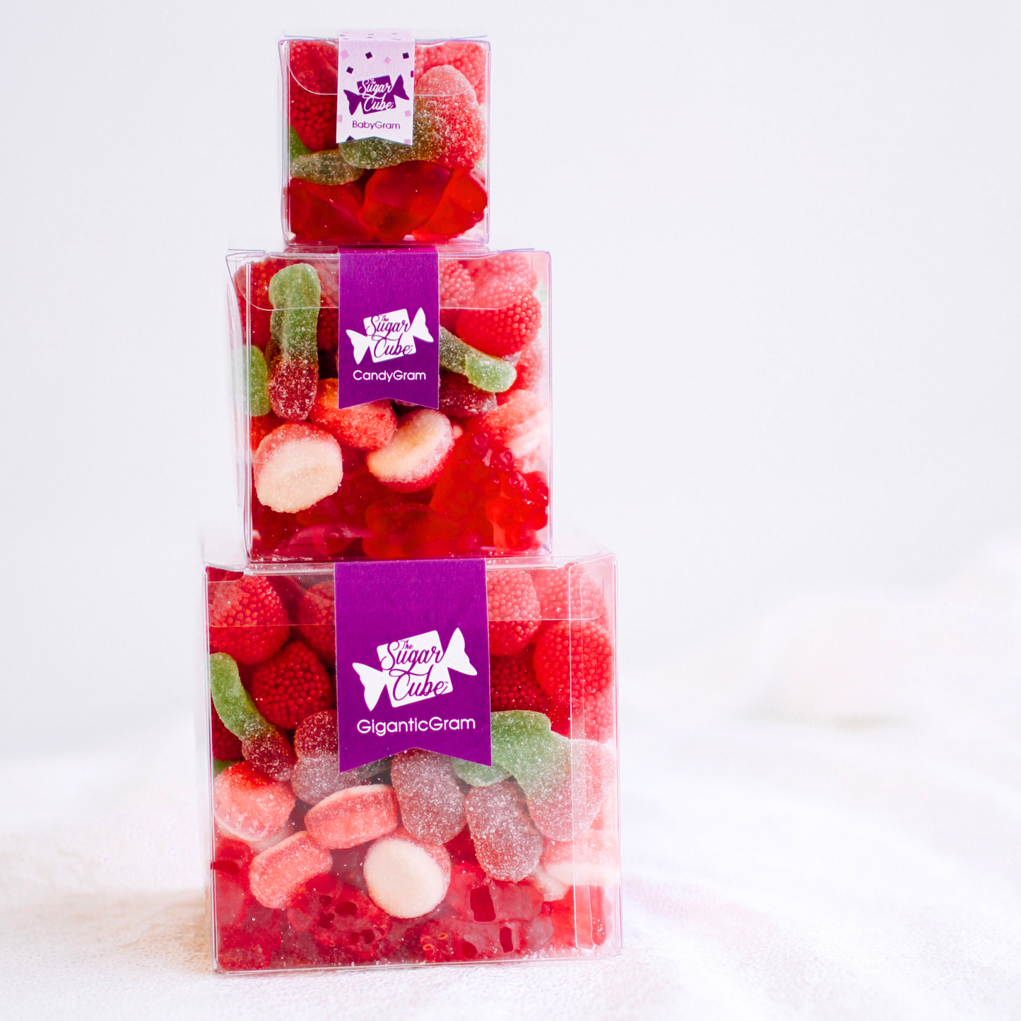 Christmas Stacked CandyGram packed with festive sweets, sours and gummies in three gift-ready candy cubes