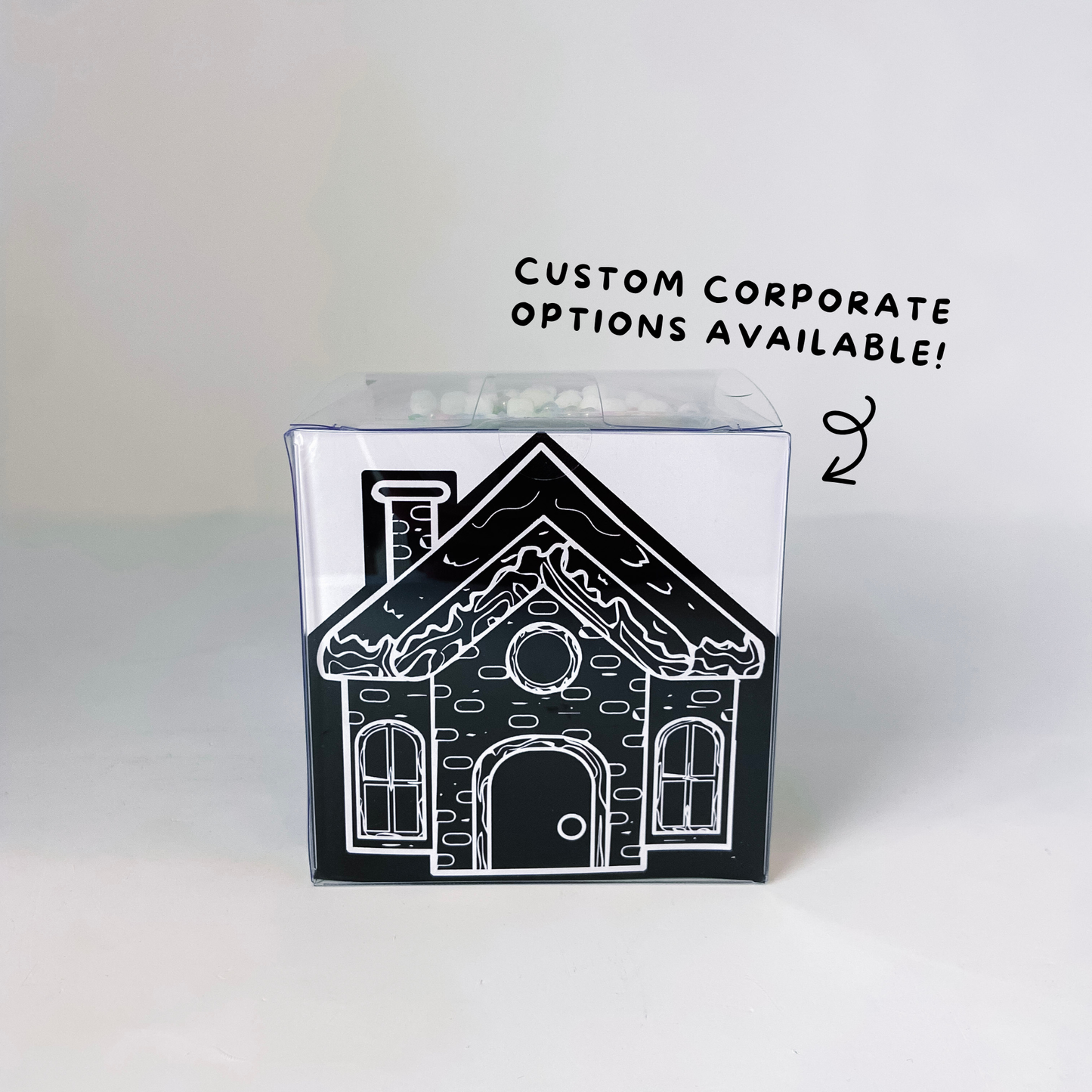 Custom corporate gingerbread house kit for Anthem featuring branded holiday packaging for employee and client gifting