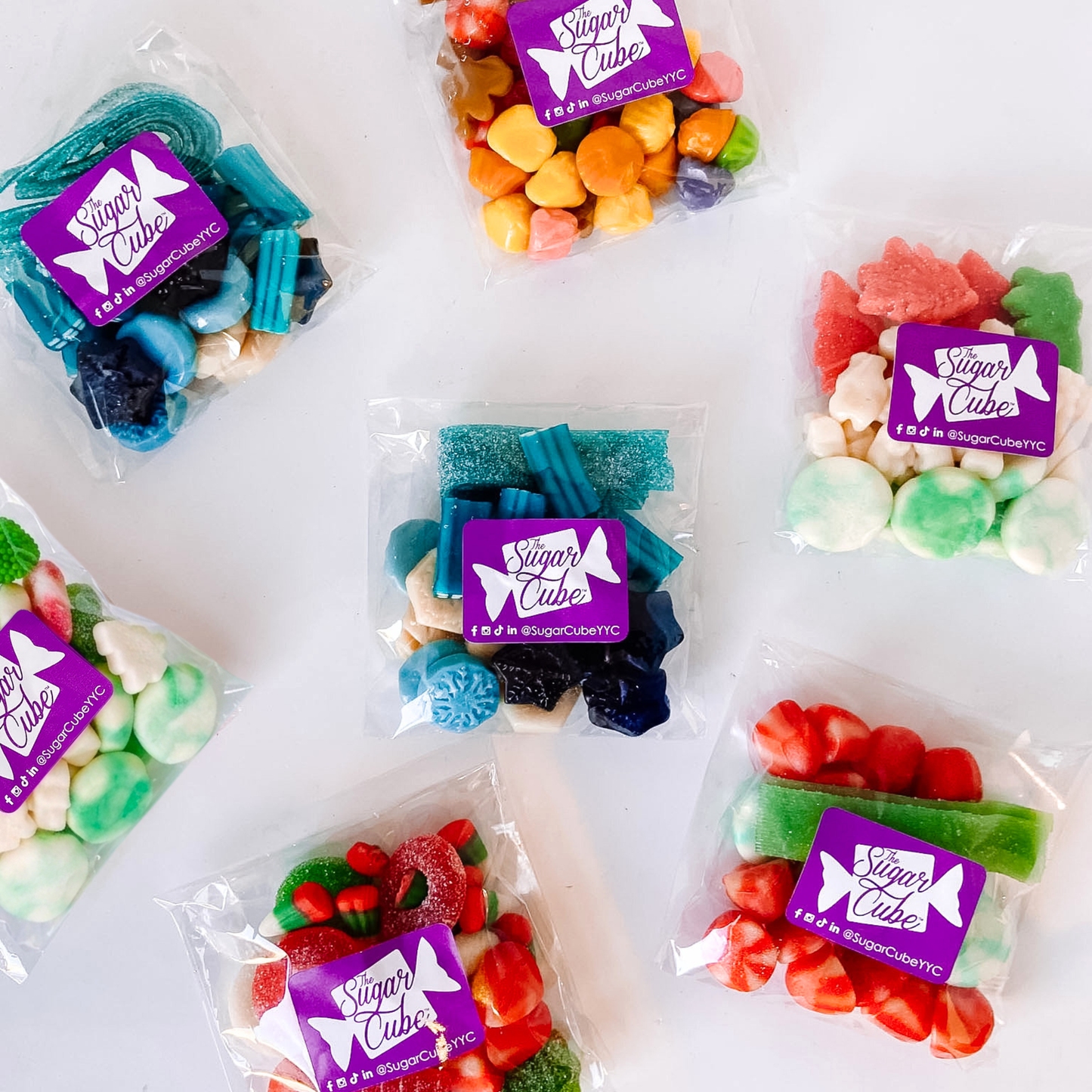 Christmas and holiday candy bag collection featuring five colourful seasonal candy mixes