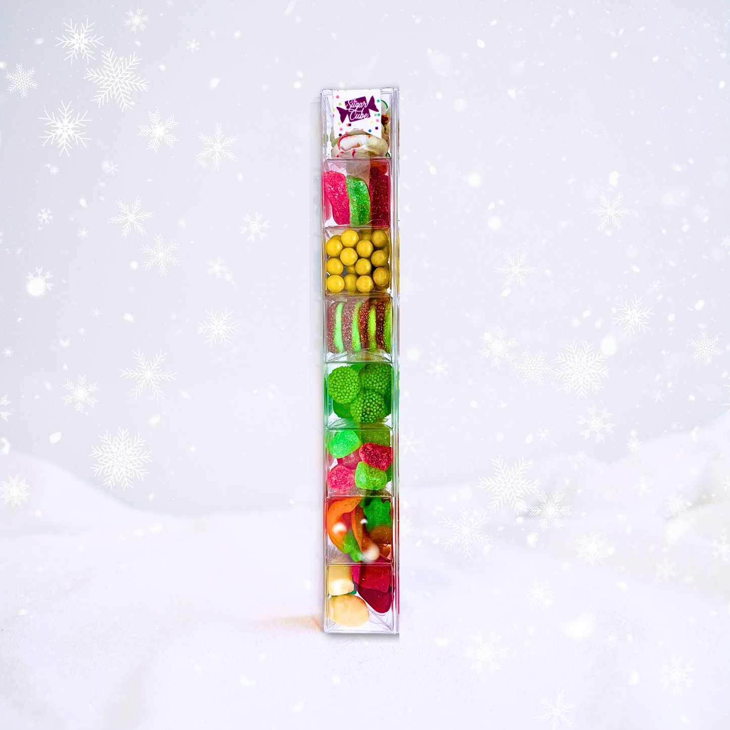 Large holiday Sweet Stack featuring eight layers of colourful festive Christmas candy